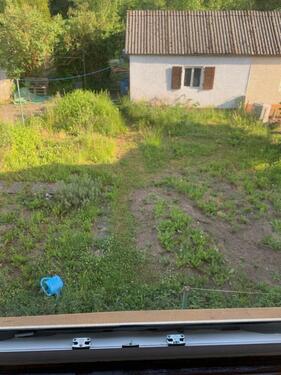 Foto - Gepflegtes Zweifamilienhaus mit Baugrundstück.