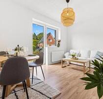 Sofort bezugsfertig! Erstbezug nach Sanierung – 2-Zimmer mit Terrasse und separater Küche in Norden!