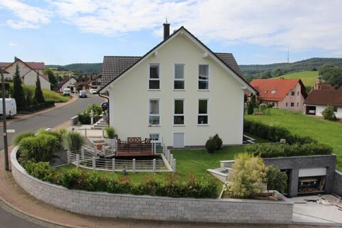 Foto - Einfamilienwohnhaus mit Einliegerwohnung