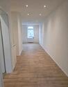 Foto - Erstbezug: moderne 1-Zimmer-Wohnung (EG) + EBK + kleine Terrasse