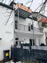 Foto - Voll sanierte 4,5-Zi.-EG-Wohnung mit eigenem Garten und Terrasse