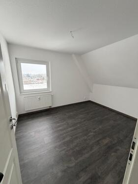 Foto - Dachgeschoßwohnung in Bitterfeld-Wolfen zur Miete