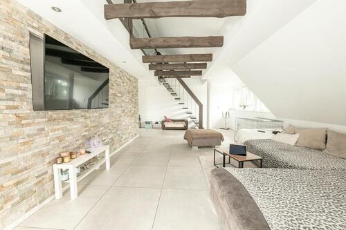 Foto - Hochwertige Dachgeschosswohnung mit Gartenanteil und atemberaubener Galerie.