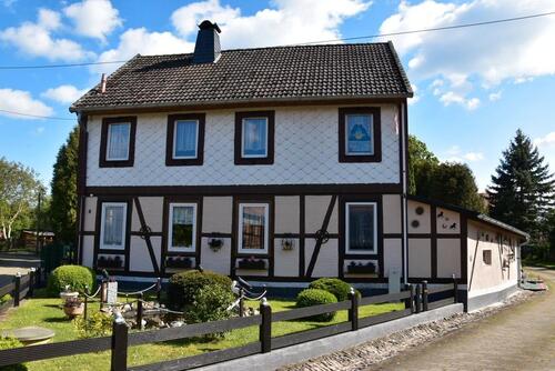 Foto - Einfamilienwohnhaus mit Garage und Carport