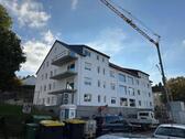Foto - Mehrfamilienhaus mit 24 Wohnungen + 26 TG Stpl. + 7 Stpl. + KFW40