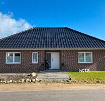 Attraktiver Neubau Winkel-Bungalow mit großem Garten - Beckdorf