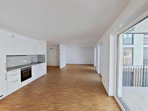 Foto - Große 2-Zimmer-Neubauwohnung mit EBK, Walk-In Dusche und Top-Anbindung