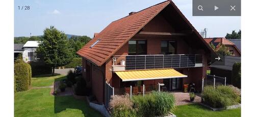 Foto - Ein,-u. Mehrfamilienhaus m. Gewerbeabteil