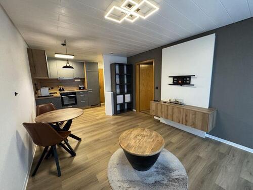 Foto - Moderne 1.5 Zimmer-Wohnung mit Balkon und privaten Stellplatz