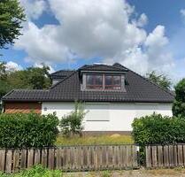 Grundstück mit charmantem Einfamilienhaus in Hamburg-Niendorf