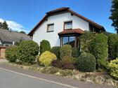 Foto - Einfamilienhaus mit Garage + separates Baugrundstück