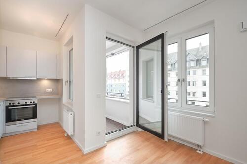 Foto - Moderne 1-Zimmerwohnung mit Einbauküche und Loggia