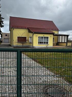 Foto - Grundstück mit Einfamilienhaus zu verkaufen