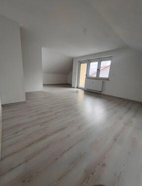 Foto - Dachgeschosswohnung mit Einbauküche, Garten und Stellplätze