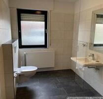 Sanierte 3-Zimmer-Erdgeschosswohnung mit Einbauküche, Terrasse, Gartenzugang, PKW-Stellplatz in Wildeshausen, LK Oldenburg