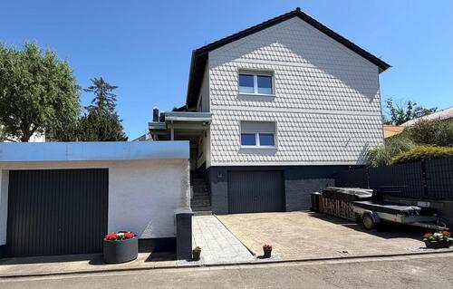 Foto - Wohnung mit GalerieDachgeschossausbau, Garage und Garten