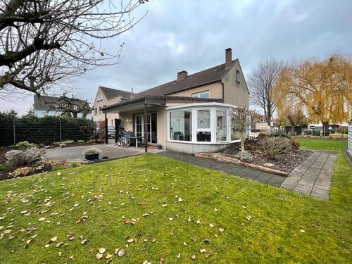 Foto - Elegante Erdgeschosswohnung mit Wintergarten und Fußbodenheizung