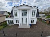 Foto - Modernes Einfamilienhaus Neubau mit Fußbodenheizung und Küche