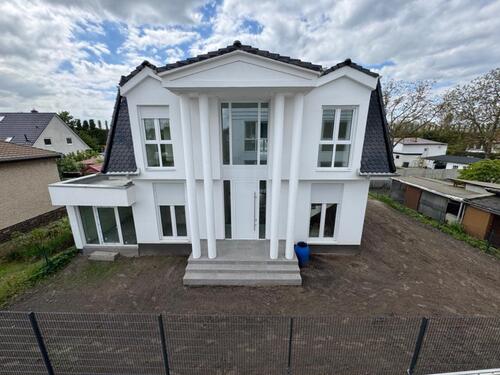 Foto - Modernes Einfamilienhaus Neubau mit Fußbodenheizung und Küche