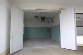 Foto - Werkstatt mit 42 m² beheizt, inklusive zwei PKW-Stellplätzen