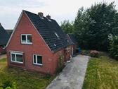 Foto - Einfamilienhaus mit großem Grundstück direkt am Kanal