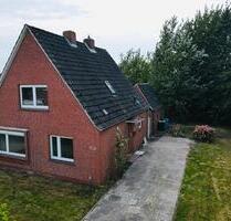 Einfamilienhaus mit großem Grundstück direkt am Kanal - Upgant-Schott