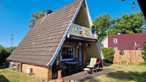 Foto - Ferienhaus am Bernsteinsee Conneforde – mit Garten und Seeblick