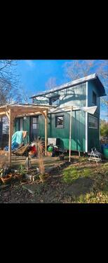 Foto - Tiny Haus auf Rändern großer Schäferwagen mit einem Dachgeschoss