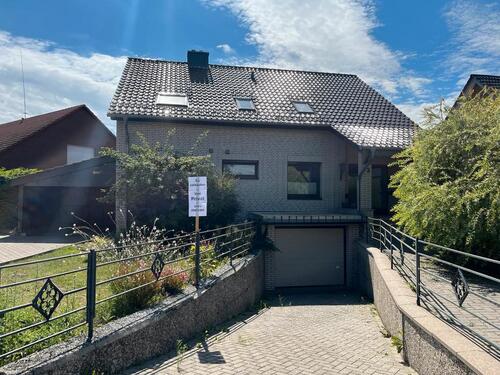 Foto - Einfamilienhaus mit Einliegerwohnung Haus freistehend