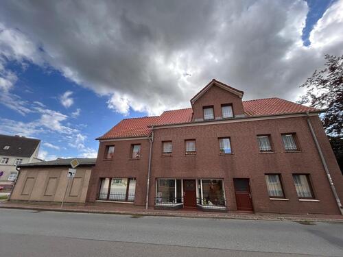 Foto - Wohn- und Geschäftshaus mit Einliegerwohnung