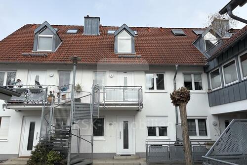 Foto - Wohnen auf drei Ebenen – stilvolle Maisonette mit Balkon.