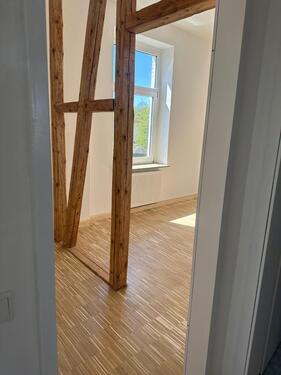 Foto - Erstbezug nach Sanierung - helle Dachgeschosswohnung in Ortsmitte