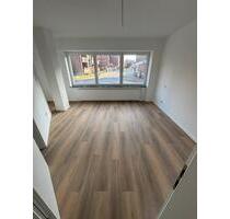 Exklusives Garten-Loft: Erstbezug mit Kamin im Herzen Aschebergs