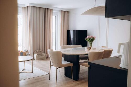 Foto - Terrassenwohnung: Lichtdurchflutet, mit Einbauküche, Smart-Home und Südwest-Garten