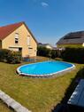 Foto - Einfamilienhaus mit Pool, Garage und Garten im Neubaugebiet