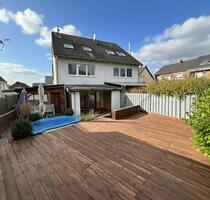 Charmante Doppelhaushälfte mit Wintergarten, Garten und vielseitigen Nutzungsmöglichkeiten - Frechen