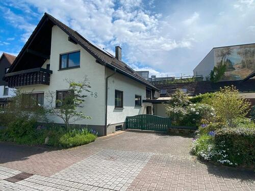 Foto - Einfamilienhaus mit 6 Zimmer, Gartenanteil, Garage mit Grube