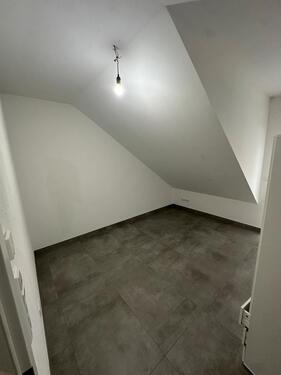 Foto - Moderne 3-Zimmer-Dachgeschosswohnung KfW-55