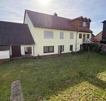 Einfamilienhaus mit Nebengebäuden, separater Einliegerwohnung und - Guldental