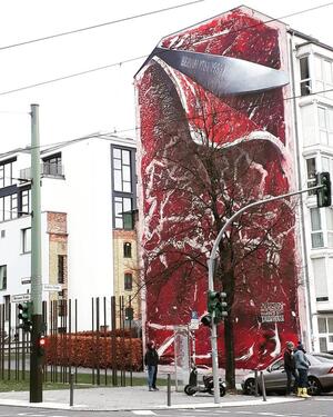 Foto - Lichtdurchflutete Wohnung im berühmten Steak Art Mural Gebäude