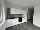 Foto - Charmante 2-Zimmer-Wohnung im Obergeschoss mit moderner Einbauküche