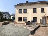 Foto - Einfamilienhaus mit Einliegerwohnung