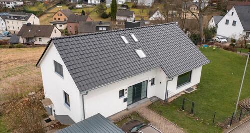 Foto - Freistehendes Einfamilienhaus mit Einliegerwohnung