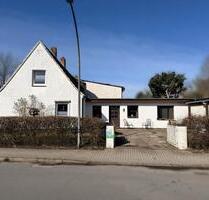 Siedlungshaus mit Einliegerwohnung und Garagen in Norderstedt