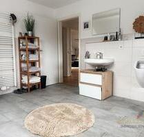 Mietwohnung einer modernen 3 Zimmer-Wohnung im 1.Og (mit Garten) nach Sanierung i.r.L von Schwalbach