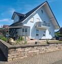 Foto - Einfamilienhaus mit Einliegerwohnung