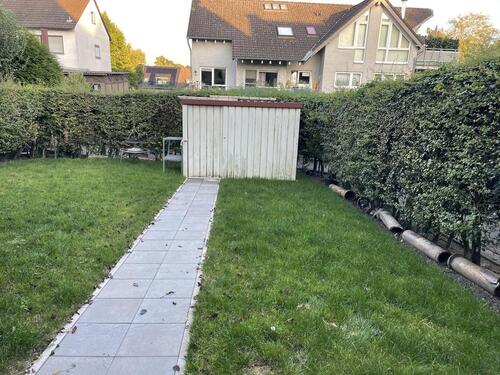 Foto - Geräumige 2-Zimmer Wohnung mit eigenem Garten und Hobbyraum