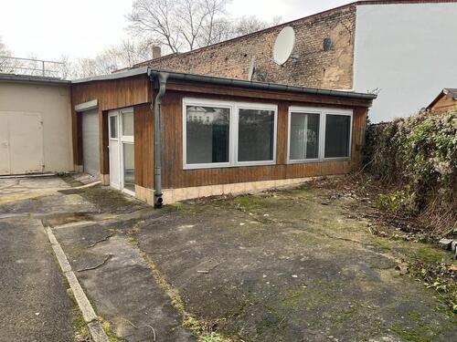 Foto - Großes Lager im EG mit Einfahrt und Büro + Bad