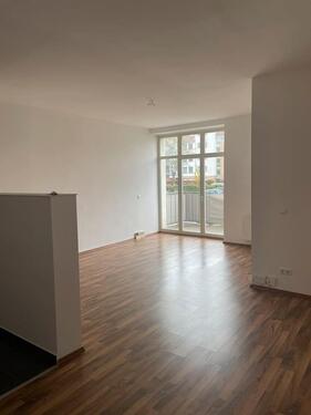 Foto - Helle Loftwohnung mit Balkon & Garten – direkt bezugsbereit