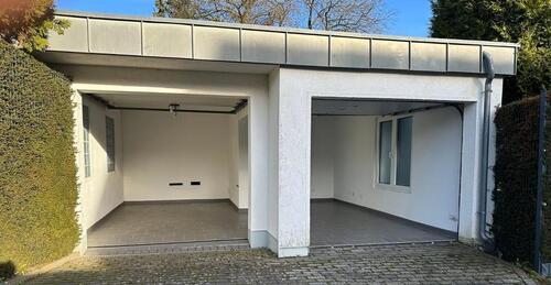 Foto - gedämmte Doppel Garage mit Strom und elektrischen Toren